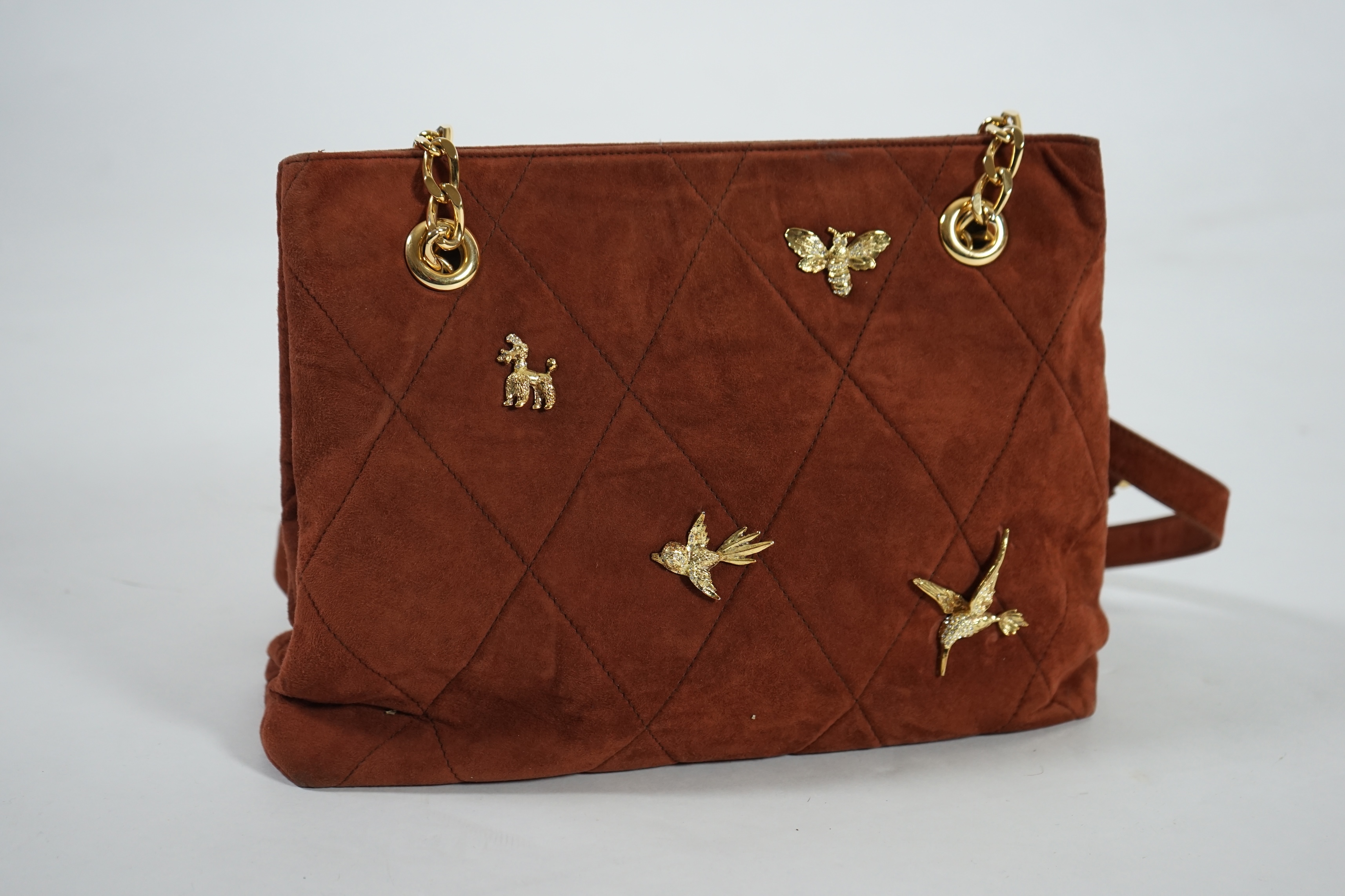 A selection of lady's handbags including a VERY Valentino black canvas bag with gold decorated chain handles, a Mary Frances black suede faux snake skin print shoulder bag with embellished fastening, a tan suede shoulder